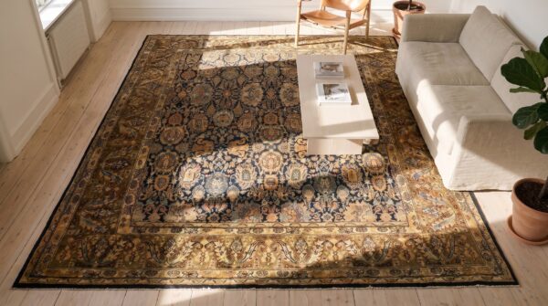 Antique square blue persian bibikabad rug with allover tribal floral pattern 2 Antique square blue persian bibikabad rug with allover tribal floral pattern (sku 19776) - styled overhead view