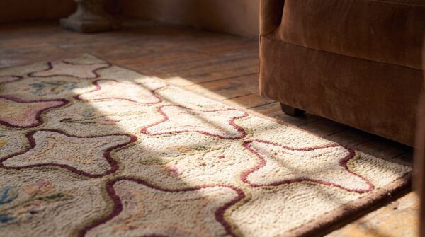 Antique square four pointed star design american folk art hooked rug 8 Antique square four pointed star design american folk art hooked rug (sku 17184) - in-room detail
