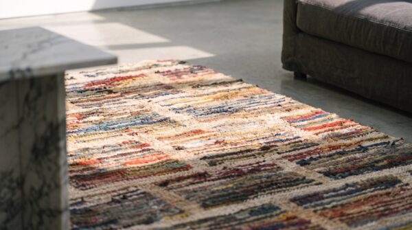 Antique square geometric layered brick pattern american hooked rug (sku 20485) - in-room detail