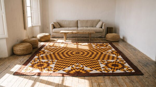 Square geometric medallion wool hand knotted 1920s american antique rug 12 Square geometric medallion wool hand knotted 1920s american antique rug (sku 20655) - room view