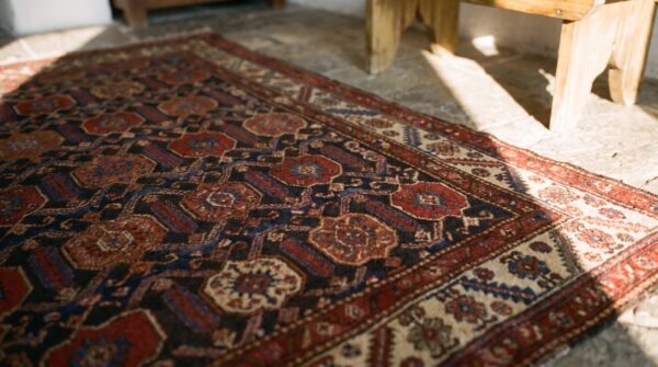 Antique square malayer persian tribal geometric rug - 1920s (sku 21110) - in-room detail