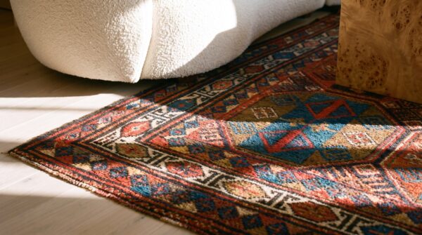 Antique square soumak small scatter size wool multicolor red rug 11 Antique square soumak small scatter size wool multicolor red rug (sku 25090) - in-room detail