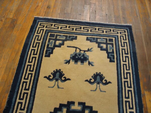 Antique swastika medallion pattern small scatter size mongolian rug (sku 21177) - room view