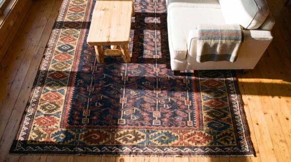 Antique tribal hand knotted wool pile allover geometric blue persian baluch rug 2 Antique tribal hand knotted wool pile allover geometric blue persian baluch rug (sku 25286) - styled overhead view