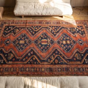 Tribal Antique Hand Knotted Wool Pile Caucasian Kazak Coral Rug (SKU 17632) - styled overhead view