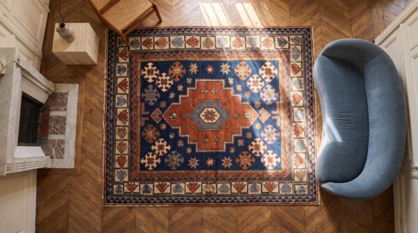 Antique tribal caucasian hand knotted square rug - small scatter size (sku 20820) - styled overhead view