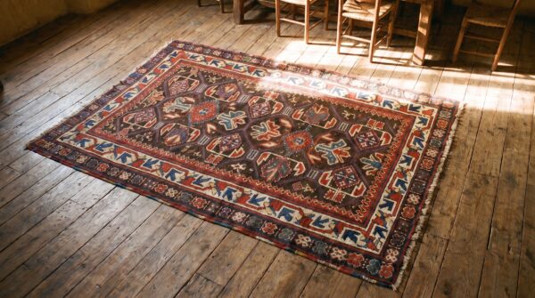 Tribal geometric brown earth tone antique small late 19th century caucasus kazak rug 2 Tribal geometric brown earth tone antique small late 19th century caucasus kazak rug (sku 18806) - styled overhead view