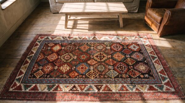 Antique tribal geometric caucasian chi chi wool pile 19th century rug 2 Antique tribal geometric caucasian chi chi wool pile 19th century rug (sku 20308) - styled overhead view