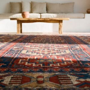 Tribal Geometric Colorful Jewel Tone Antique Caucasian Kazak Rug (SKU 19277) - in-room detail