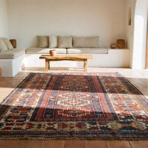 Tribal Geometric Colorful Jewel Tone Antique Caucasian Kazak Rug (SKU 19277) - styled overhead view