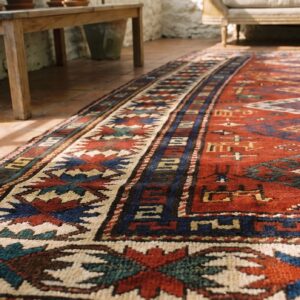 Antique Tribal Geometric Coral Caucasian Kazak Rug (SKU 18390) - in-room detail
