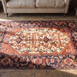 Tribal Geometric Herati Design Small Antique Ivory Persian Malayer Rug (SKU 21204) - styled overhead view