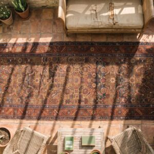 Antique Tribal Geometric Herati Persian Bakshaish Hallway Runner Rug (SKU 17330) - styled overhead view