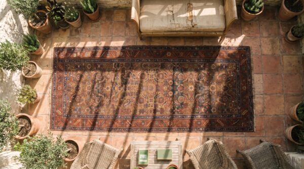 Antique tribal geometric herati persian bakshaish hallway runner rug 2 Antique tribal geometric herati persian bakshaish hallway runner rug (sku 17330) - styled overhead view