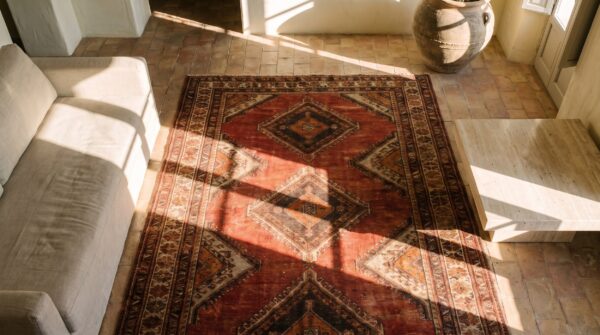 Tribal geometric antique khotan room size wool pile east turkestan rug 2 Tribal geometric antique khotan room size wool pile east turkestan rug (sku 20045) - styled overhead view