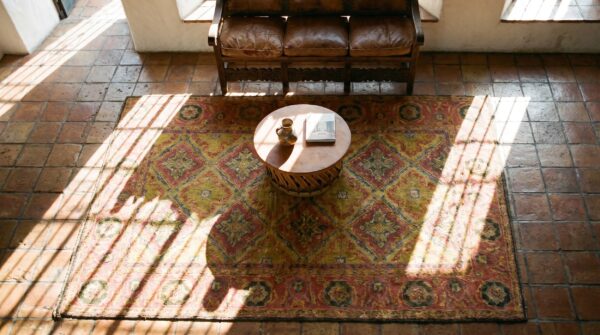 Antique tribal geometric pattern cotton scatter size yellow agra rug 2 Antique tribal geometric pattern cotton scatter size yellow agra rug (sku 19439) - styled overhead view