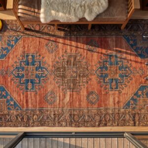Antique Tribal Geometric Pattern Persian Baluch Small Area Rug (SKU 21584) - styled overhead view