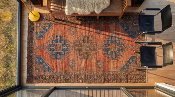 Antique tribal geometric pattern persian baluch small area rug (sku 21584) - styled overhead view
