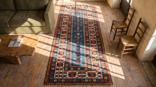 Antique tribal late 19th century blue caucasian kazak hallway runner rug 2 Antique tribal late 19th century blue caucasian kazak hallway runner rug (sku 18458) - styled overhead view