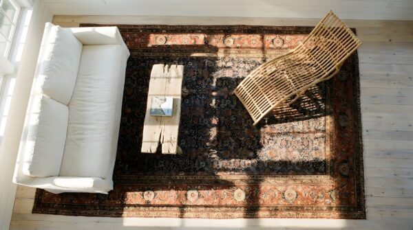 Tribal mid 19th century antique nw persian long and narrow oversized rug (sku 23496) - styled overhead view