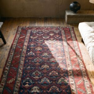 Antique Tribal Navy Blue Caucasian Hallway Runner Kazak Rug (SKU 18331) - styled overhead view
