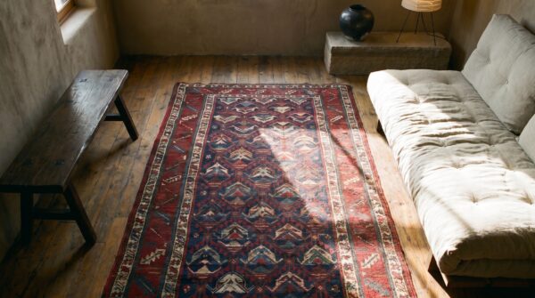 Antique tribal navy blue caucasian hallway runner kazak rug (sku 18331) - styled overhead view