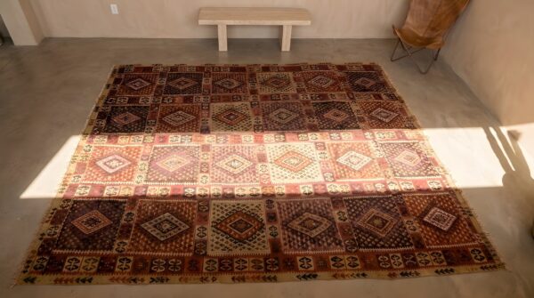 Tribal room size flatwoven antique geometric turkish kilim rug (sku 22107) - styled overhead view
