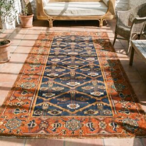 Antique Tribal Shrub Pattern Northwest Persian Hallway Runner Rug (SKU 18734) - styled overhead view