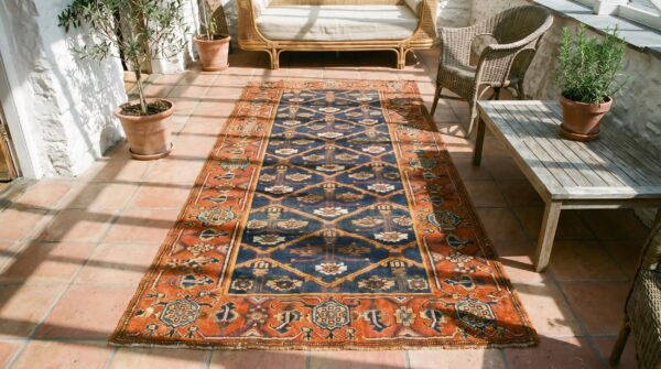 Antique tribal shrub pattern northwest persian hallway runner rug (sku 18734) - styled overhead view