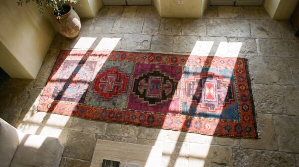 Antique turkish yuruk hallway runner rug - jewel tone tribal geometric 2 Antique turkish yuruk hallway runner rug - jewel tone tribal geometric (sku 20875) - styled overhead view