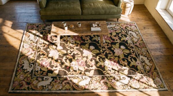 Antique ukrainian pile carpet 7'3"×9'3" chocolate brown & moss green, floral roses, 1860s (sku 18756) - styled overhead view