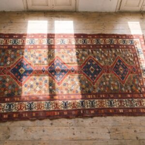 Unusual Unique Antique Artistic Tribal Geometric Caucasian Shirvan Rug (SKU 20138) - styled overhead view