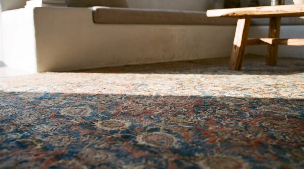 Antique w. Persian bijar carpet 11'2"×18'2" powder blue field, soft red border, circa 1880 25 Antique w. Persian bijar carpet 11'2"×18'2" powder blue field, soft red border, circa 1880 (sku 18650) - in-room detail
