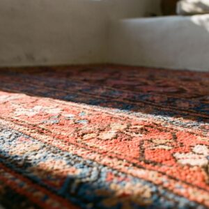 Antique W. Persian Kurdish Carpet 4'×8'9" Brown Field, Red Border, Late 19th Century (SKU 19677) - in-room detail