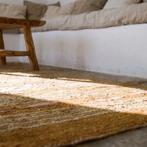 Warm Casual Antique Navajo Native American Square Flat Weave Rug (SKU 21420) - in-room detail