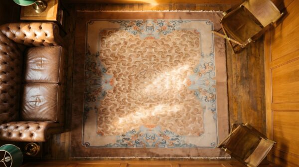 Antique warm cream color floral cloud band design chinese peking rug 2 Antique warm cream color floral cloud band design chinese peking rug (sku 23085) - styled overhead view