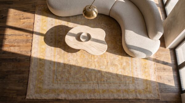 Washed out light yellow antique herati pattern cotton agra rug 2 Washed out light yellow antique herati pattern cotton agra rug (sku 21054) - styled overhead view