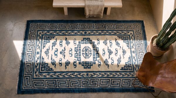 Antique white and blue color small size mongolian rug (sku 21202) - styled overhead view