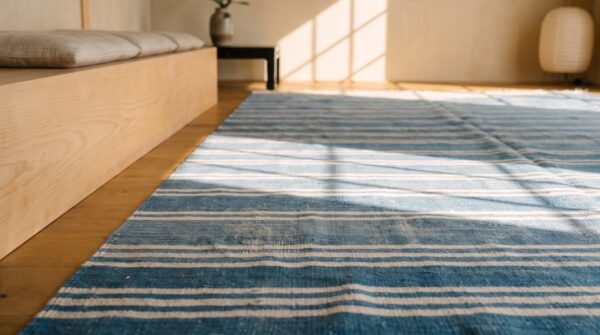 White and blue striped antique long oversized indian dhurrie flatweave rug 7 White and blue striped antique long oversized indian dhurrie flatweave rug (sku 21046) - in-room detail