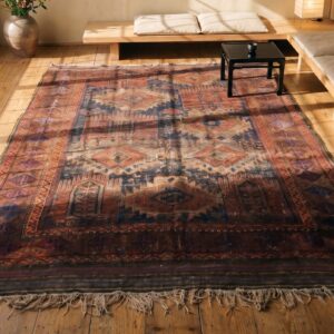Worn Distressed Antique Shabby Chic Persian Baluch Geometric Tribal Rug (SKU 21565) - styled overhead view
