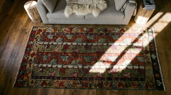 Antique yastik turkish geometric knotted rug 2 Antique yastik turkish geometric knotted rug (sku 25179) - styled overhead view