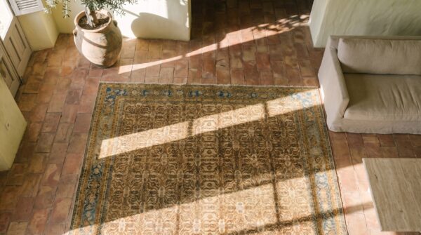 Antique yellow room size indian agra rug 2 Antique yellow room size indian agra rug (sku 17329) - styled overhead view