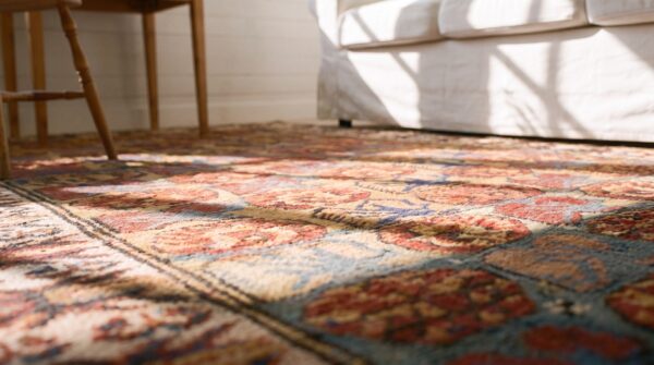 Yellow tribal floral pattern antique small size caucasian kuba rug 8 Yellow tribal floral pattern antique small size caucasian kuba rug (sku 21870) - in-room detail