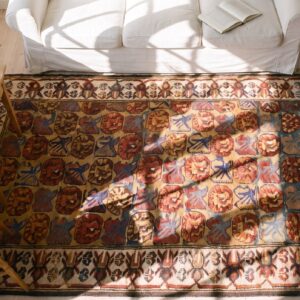 Yellow Tribal Floral Pattern Antique Small Size Caucasian Kuba Rug (SKU 21870) - styled overhead view