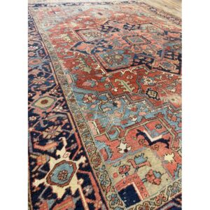 1890s Red Field Medallion Rustic Antique Heriz Knotted Wool Rug - detail view 1