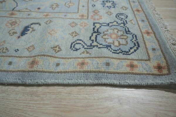 Captivating timeless light blue hand knotted wool rug 9 x 12, detail view 3