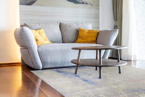 Steel blue gray abstract hand knotted wool rug 8 x 10 3 Steel blue and gray abstract hand knotted wool rug in a living room under a sofa and coffee table
