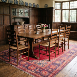 1920s Antique Donegal Rug 11'7 x 15'6 in an Arts and Crafts dining room, styled visualization