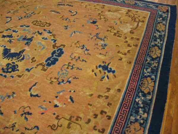 Rare yellow square mid 18th century antique chinese ningxia carpet 8 Mid-18th century chinese ningxia carpet, field with scattered flowers and the key fret border, stock number 20853