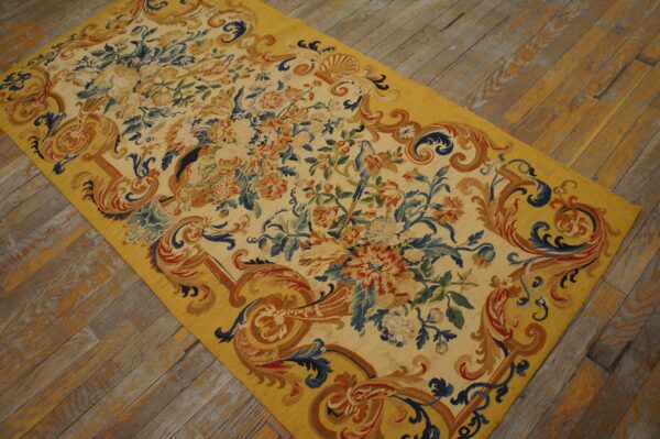 Antique french allover floral flat weave rug 6 Early 18th century french tapestry weave rug, angled view of the whole rug, stock number 25095
